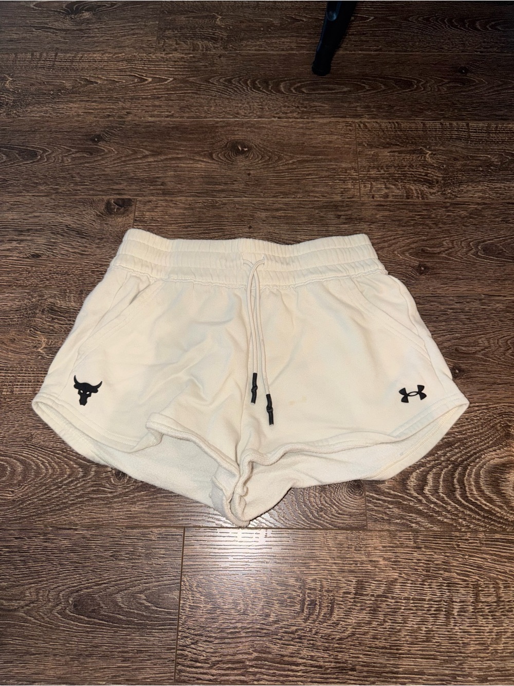 Under Armour Women’s Cream Athletic Shorts with Black Logos